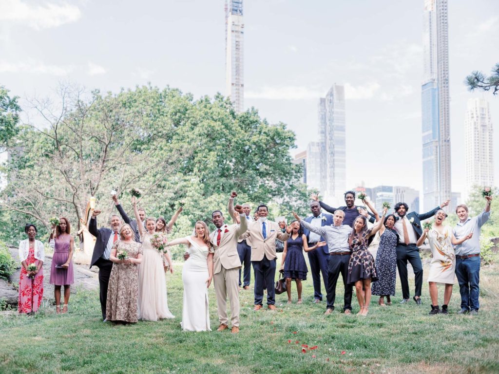 A socially distanced group photo of everyone who attended their NYC elopement.
