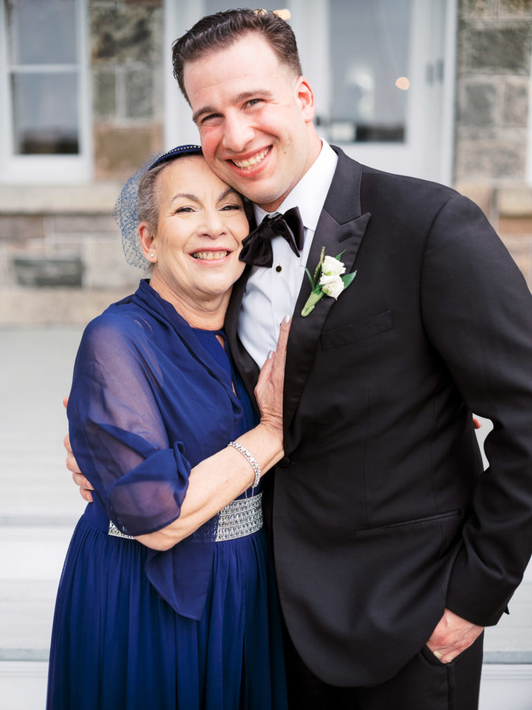 A photograph of the groom and his mother.