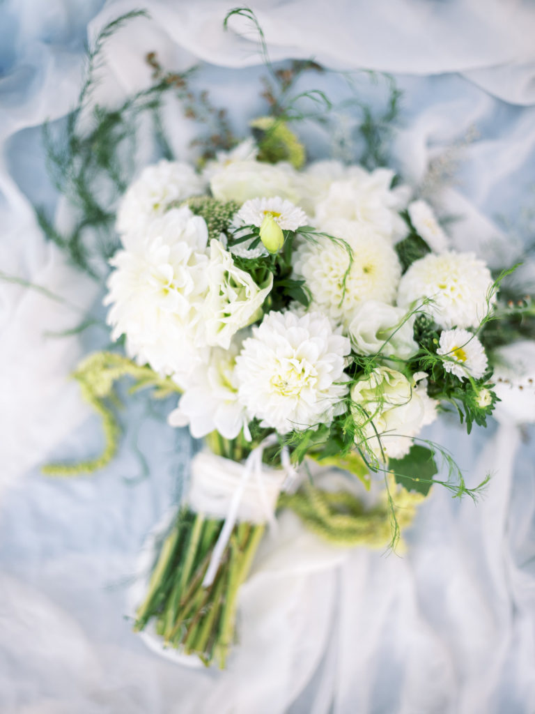 Long Island Vineyard Wedding Bride's hometown flower co boquet flatlay photo.