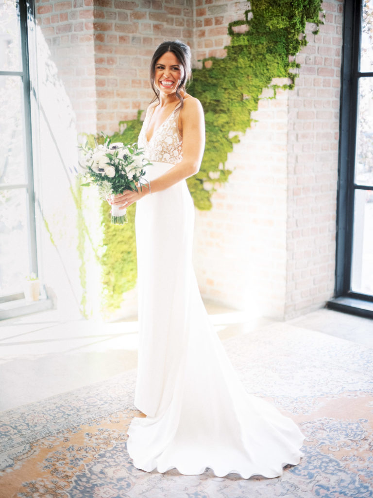 Stunning bride in Alexandra Grecco dress before The Central Park Boathouse Wedding.