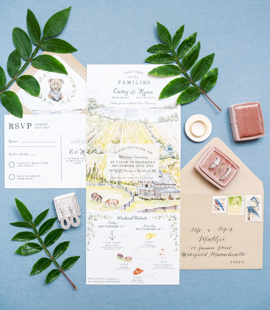 Long Island Vineyard Wedding Flatlay of an invitation suite by wide eyes paper co with ring box by the mrs box.