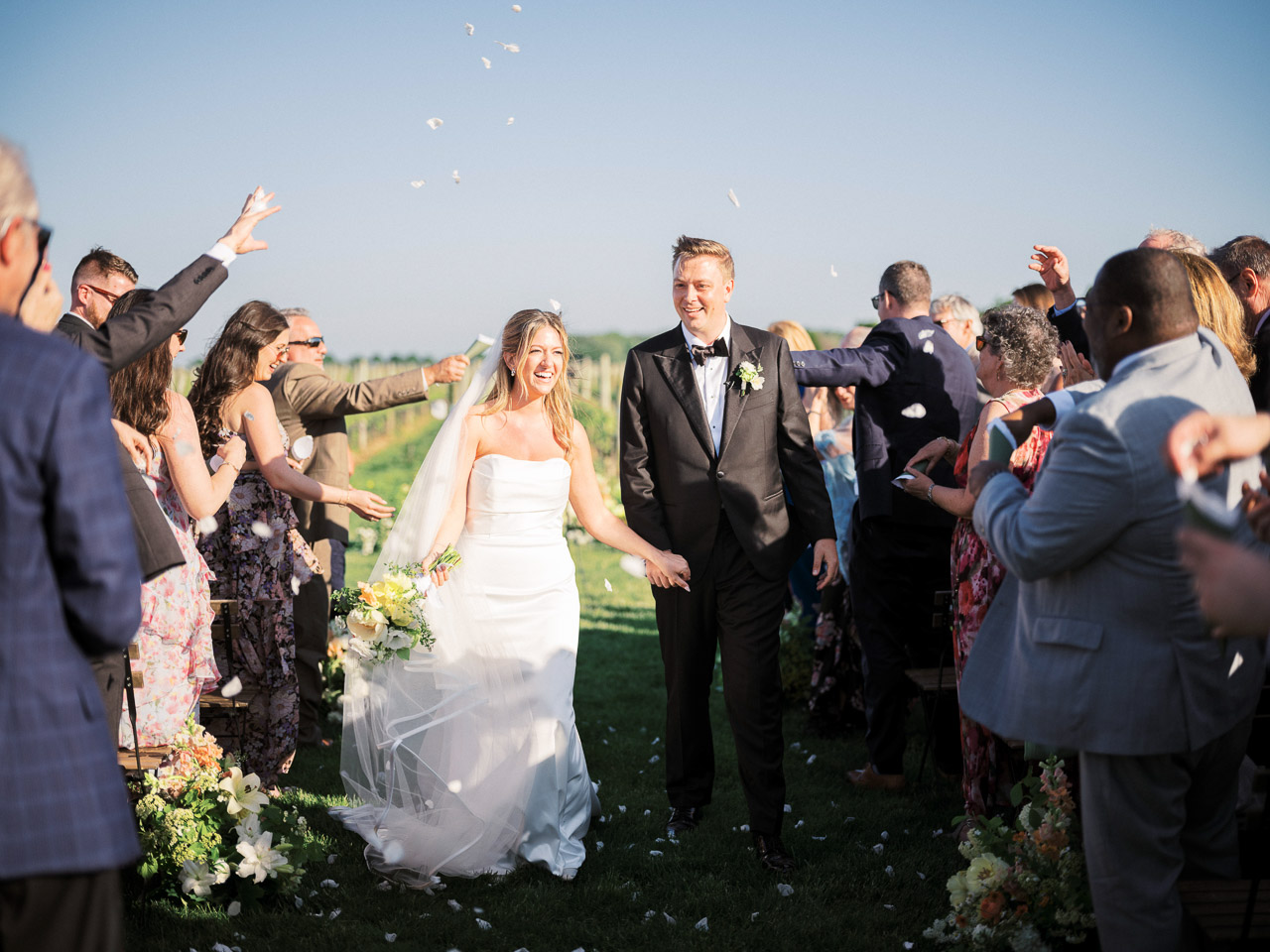 Bride and groom walk down aisle at RGNY